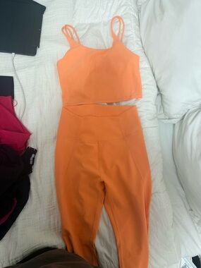 High-Waist Orange Leggings with Cropped Double-Strap Tank